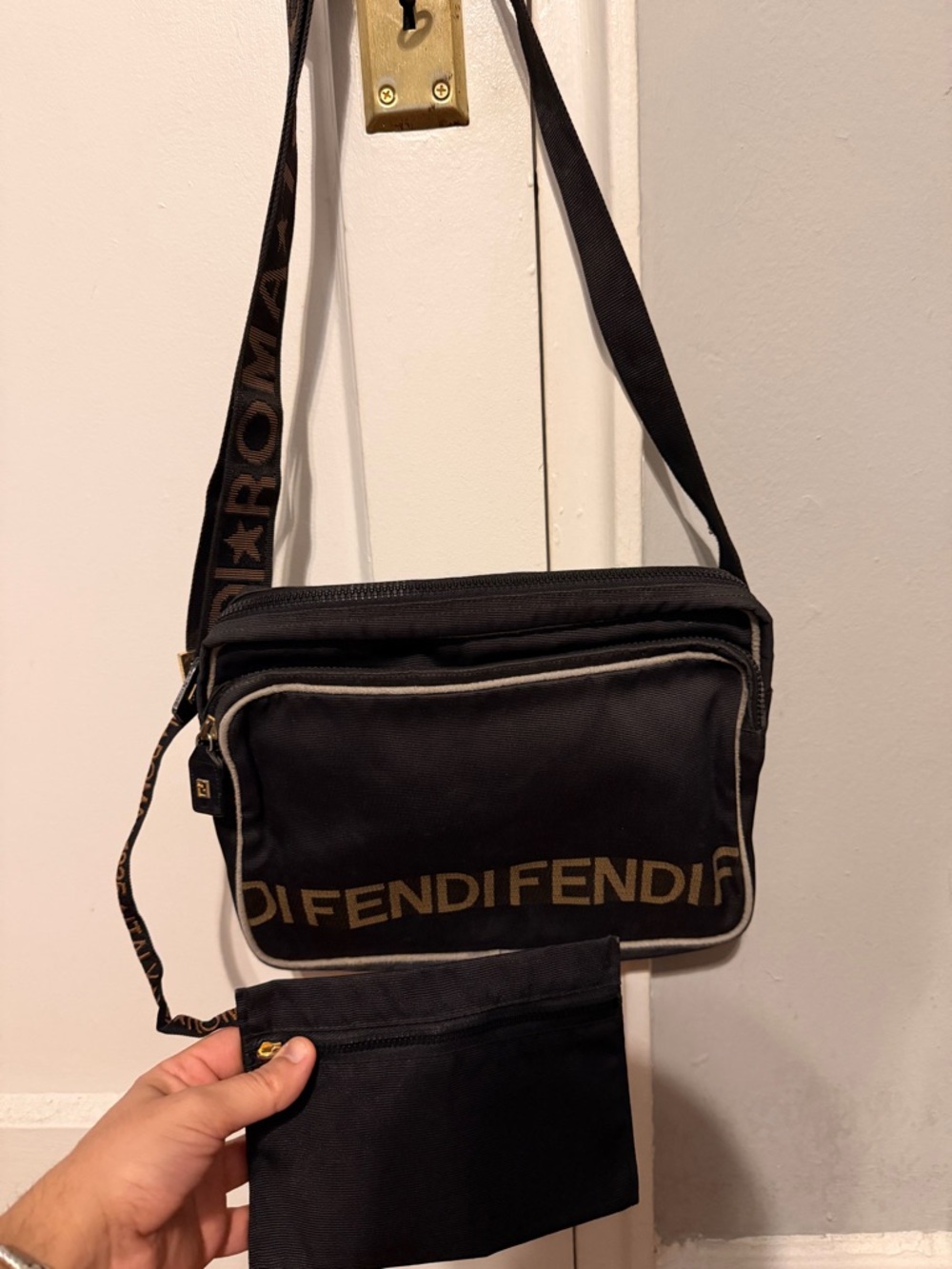 Fendi Black Crossbody Messenger Bag with a detachable Zip pouch.